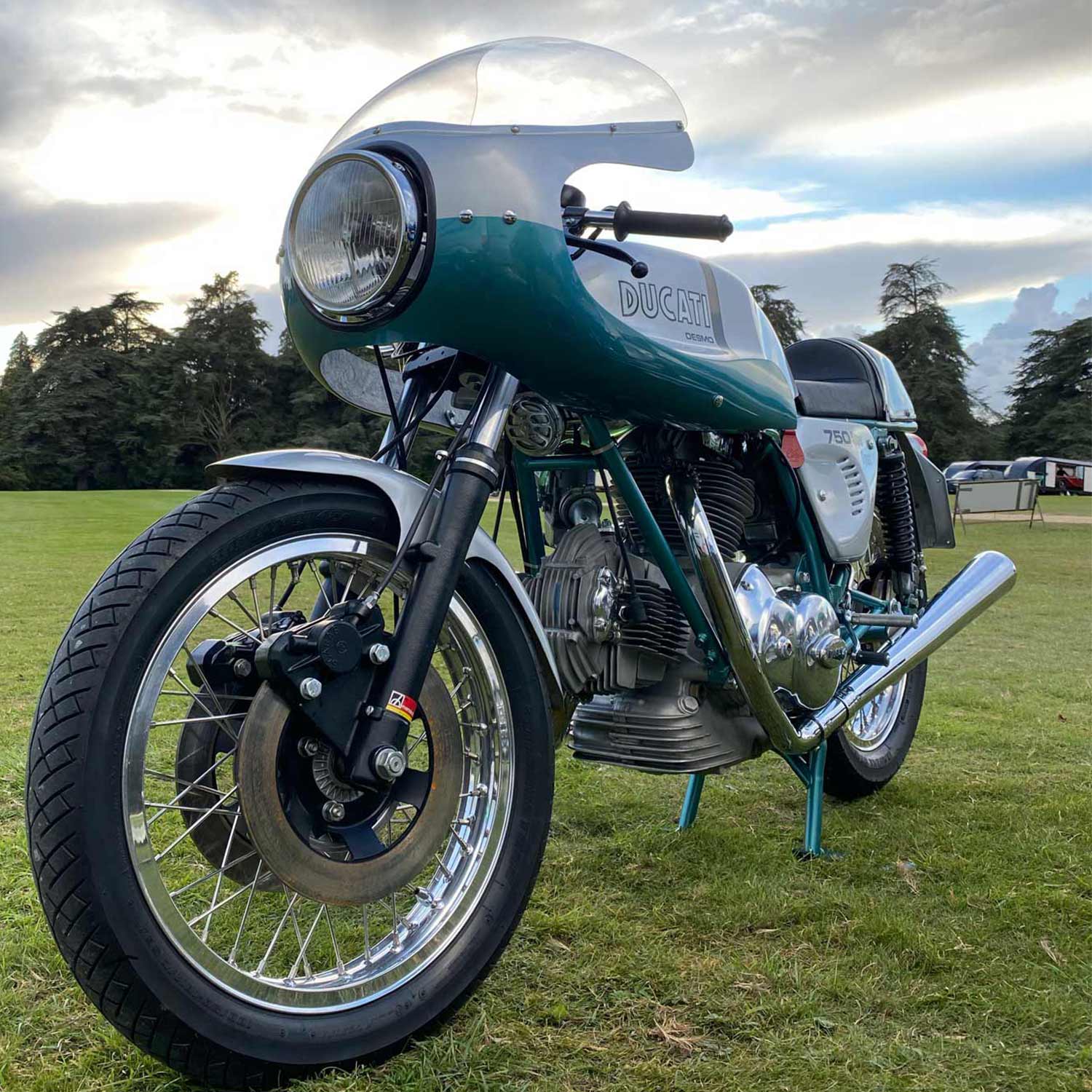 The 1974 Ducati 750SS restored by Ray Petty Meccanica on the lawn at Salon Privé 2020
