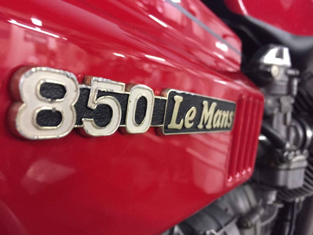 Moto Guzzi 850 Le Mans side panel badge during restoration