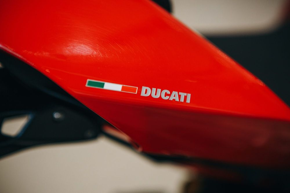Ducati lettering and Italian flag on a red fairing