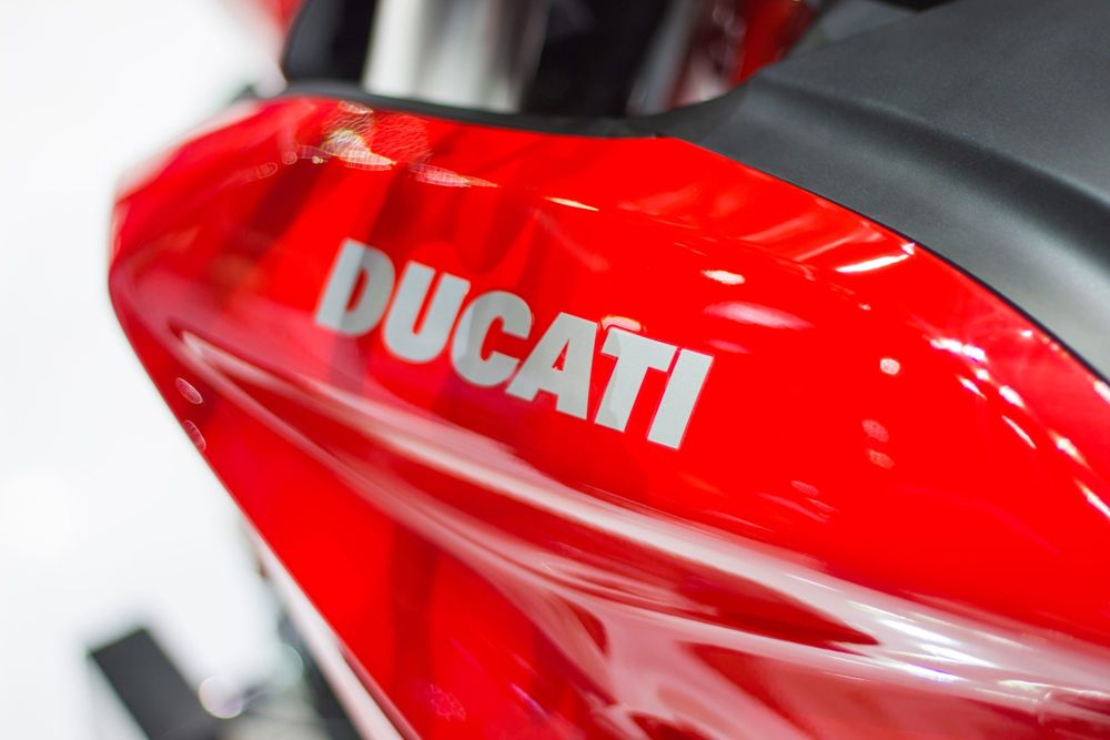 Ducati lettering on a red fairing panel
