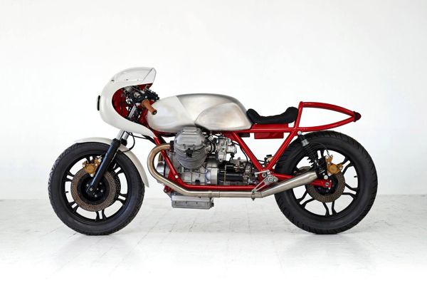 Custom Moto Guzzi with red frame and polished alloy tank, side view