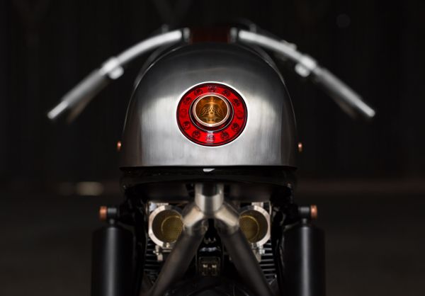 Round red tail light set into the alloy seat cowl
