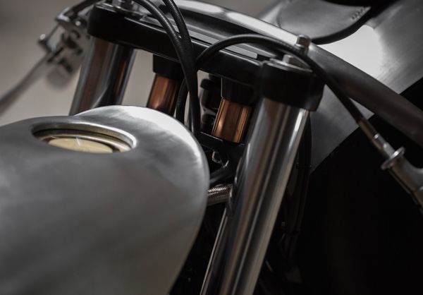 Brushed alloy tank and copper-topped forks