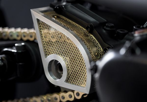Brass mesh sprocket cover on the Up Yours Copper build