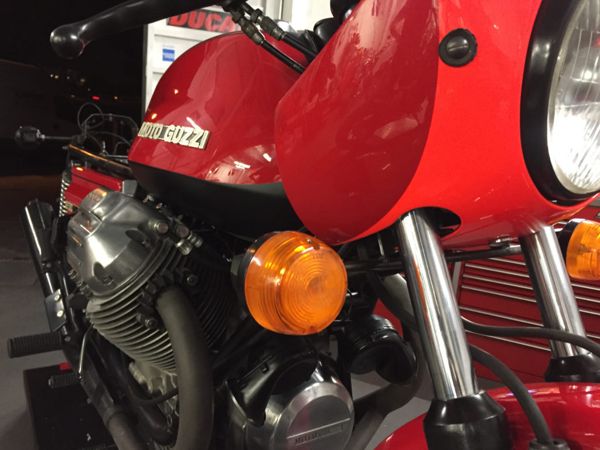 Red Moto Guzzi Le Mans fairing, engine and orange indicator