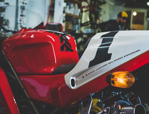 White number 1 tail section on a red Ducati superbike