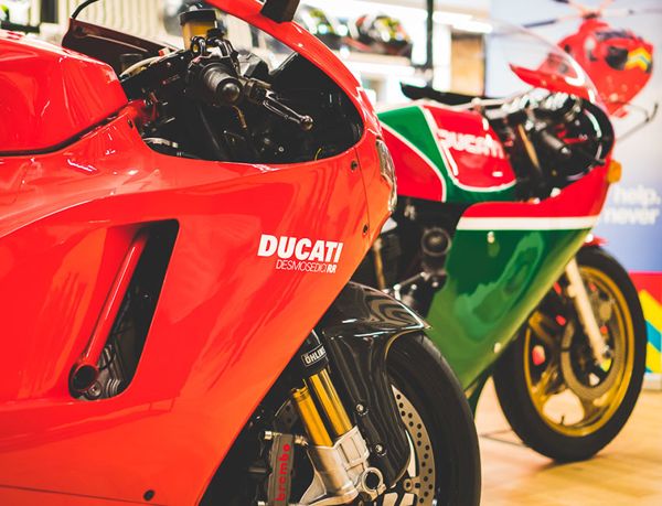 Desmosedici RR beside a classic red and green Ducati