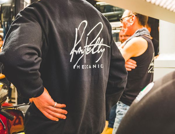 Ray Petty Meccanica sweatshirt on a guest at the fundraiser