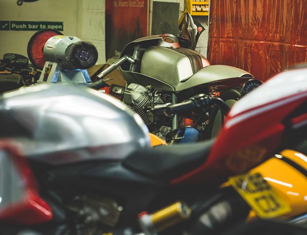 Classic Ducatis lined up in the workshop