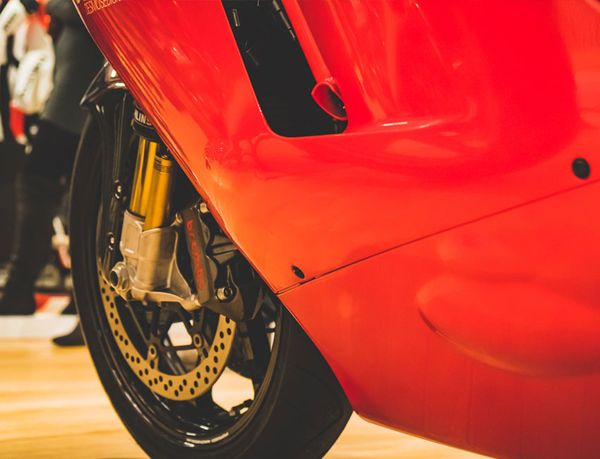 Red fairing and gold front fork of the Ducati Desmosedici RR