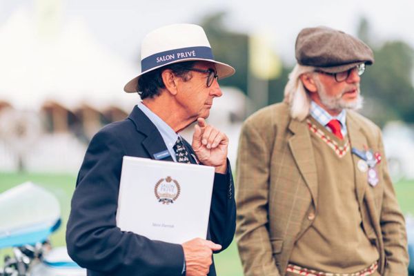 Salon Privé judges inspecting the motorcycles