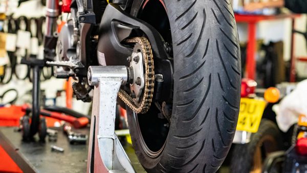 Ducati rear wheel and chain on a paddock stand