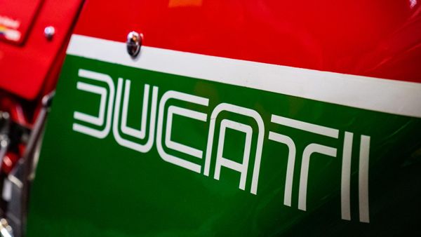 Ducati lettering on a red, white and green fuel tank
