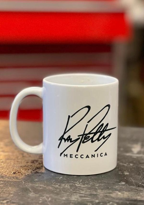 White mug with the Ray Petty Meccanica logo in black