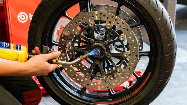 Heat being put on a brake disc bolt to free it