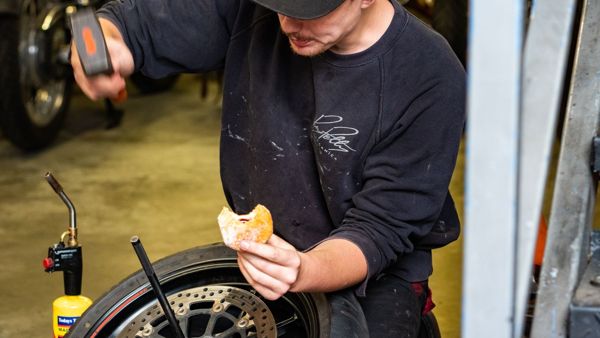 A tea break with a doughnut in the workshop